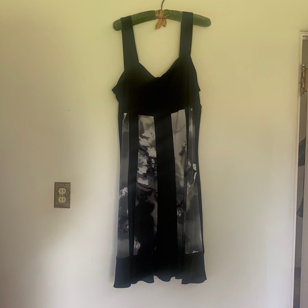 Midi length, size 20, very flattering, with black and grey stripes.